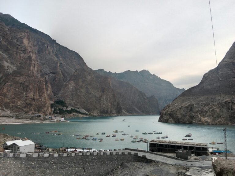 Beautiful landscape of Attabad Lake surrounded by mountains in Hunza Nagar, Pakistan.