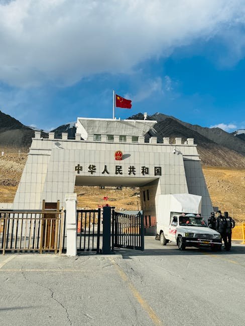 The Khunjerab Pass gateway with clear sky and mountains.